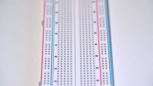 Breadboard electronics equipment mockup plate. DIY project arduino programming
