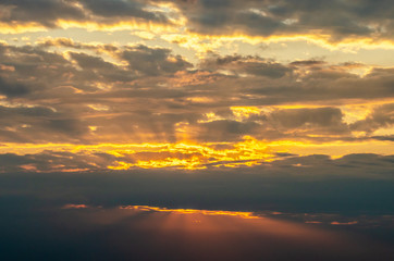 Naklejka na ściany i meble sunrise in the clouds