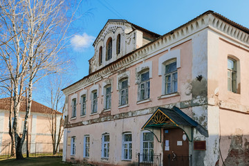 Fototapeta premium Old abandoned building of the 18th century. Facade of an ancient house.