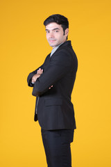 Obraz na płótnie Canvas Portrait of businessman on yellow background using as background professional business people, successful business man consultant concept.