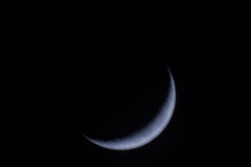 Low Angle View Of Moon Against Clear Sky At Night