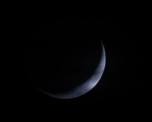 Low Angle View Of Moon Against Clear Sky At Night