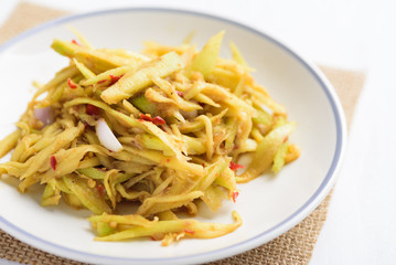 Thai food, spicy green mango salad (Tum Ma Muang)