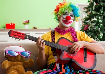Funny clown in Christmas celebration concept