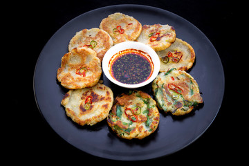 Potato with garlic chives pancake which is called gamjajeon in Korea