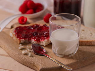 strawberry jam on a wooden board