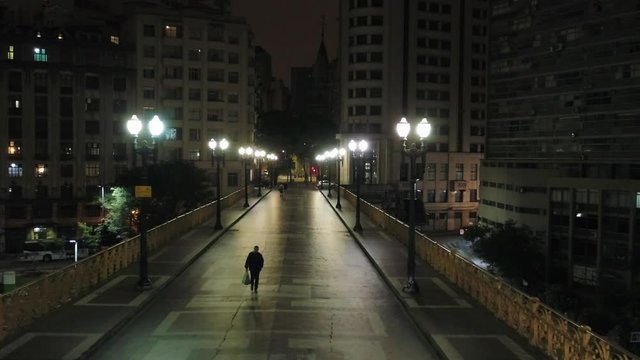 Aerial view of Santa Efigenia viaduct at night with no one in the street, at night, Sao Paulo downtown, Brazil