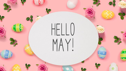 Hello May message with Easter eggs on a pink background