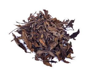 Dried tea leaves on a white background