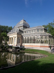 Fototapeta na wymiar The Glass Palace = Palacio de Cristal - conservatory in Buen Retiro Park Madrid Spain