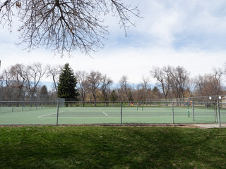 Unused Tennis Courts in an empty Park During the Covid-19 pandemic