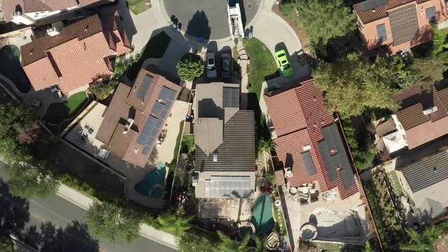 Solar Photovoltaic Panel Array on Rooftops Houses in Calabasas, Aerial View