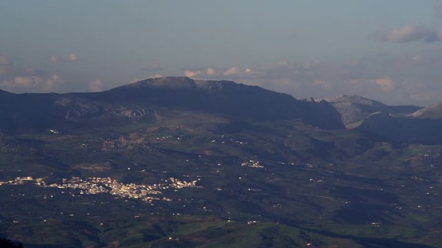 WS PAN Panning shot from Riogordo town to Comares village and La Roma mountain