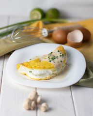 souffle omelette with cream sauce and mushrooms