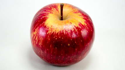 Isolated Apple on white closeup with Dew