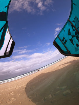 Kitesurfer launching his kite. Almost in the water! Kite cam view