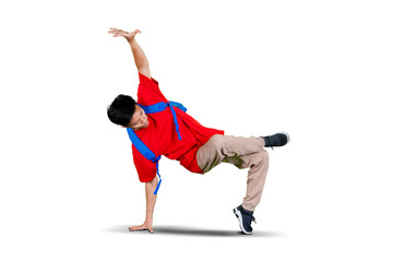 College student doing break dance in studio