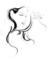 髪をかきあげる女性の横顔