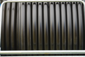 Rolled up of black irrigation hose