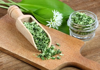 Homemade salt from bear garlic. Herbal salt from sea salt and wild garlic, lat. Allium ursinum, in...