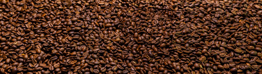 Super large high resolution panorama macro photography of a huge heap of coffee beans. Close up to...