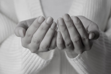 Black and white picture woman open hands, Praying hands with faith in religion and belief in god.