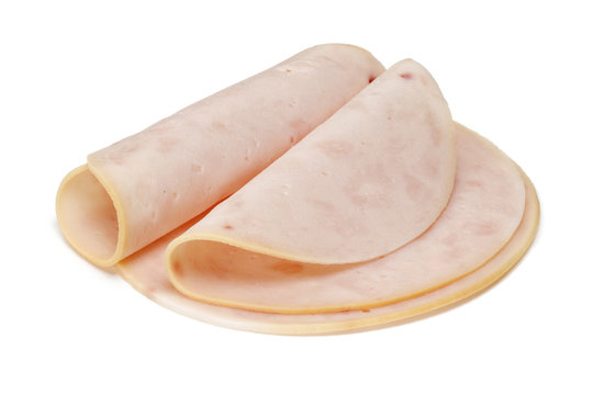 Slices of chicken ham isolated on white