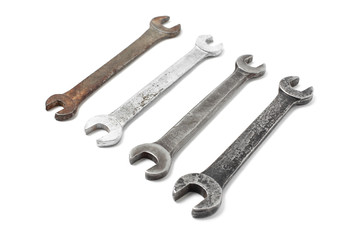 Group of old wrench tools isolated on white background 
