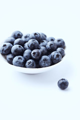 Bilberries isolated on white background. Concept for healthy nutrition. Copy space.