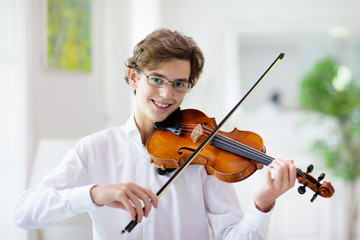 Man playing violin. Classical music instrument.