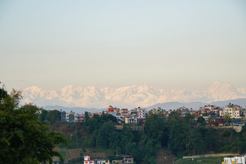 Cityscape with the Himalayan Mountains in the background