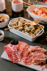 Table spread of  delicious snacks for a house party
