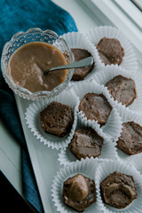 Freshly baked homemade brownies on a white plate
