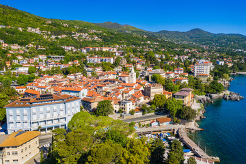 Fototapeta premium Croatia, beautiful town of Lovran and Lungomare sea walkway, aerial panoramic view in Kvarner bay coastline 