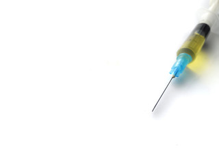 The injector. It is the disposable syringe with a needle.