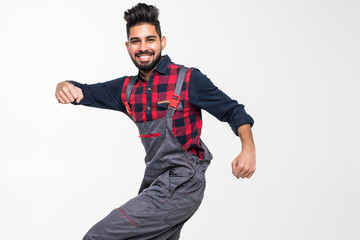 Portrait of smiling indian man worker in uniform isolated on white background