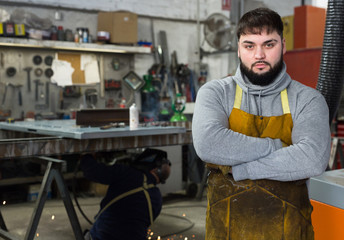 Proffessional young man  engineer  posing during work