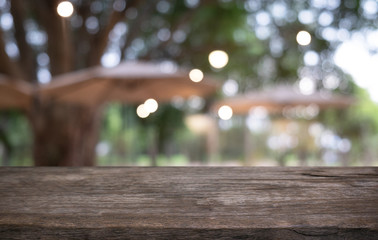 Wood Table Top in Blur Background room interior with empty copy space.