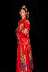 Obraz premium Portrait of wearing ancient Asian woman costume in black background