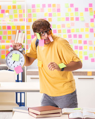 Student preparing for exams with many conflicting priorities