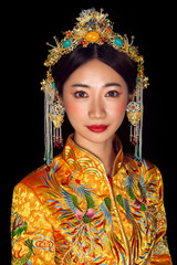 Portrait of wearing ancient Asian woman costume in black background