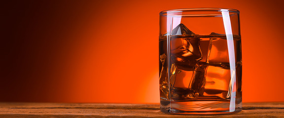 A glass of whiskey or cognac and ice cubes.