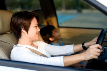 Happy family in a car