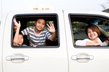 Happy family in a car