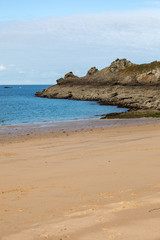 Fototapeta na wymiar Beautiful sandy beach on the Emerald coast between Saint Malo and Cancale. Brittany, France