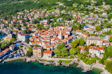 Fototapeta na wymiar Croatia, Adriatic coast, beautiful old town of Lovran, historic center and coastline aerial view, Kvarner bay 