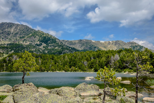 Landscape in the mountains with a beautiful lake (Malniu Lake, Catalonia, Spain).