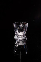 The black background is a scan in which water pours. Splashing water on glass