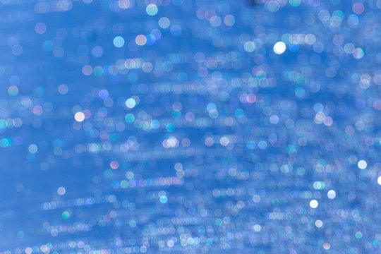 multicolored bokeh from water drops as a background