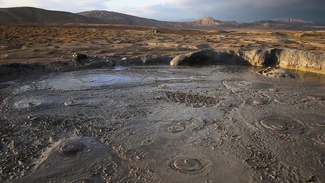 Crater of mud volcano in Gobustan, Azerbaijan. The eruption of a mud volcano.